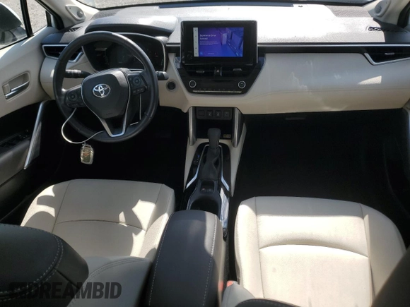 2023 Toyota Corolla Cross XLE with VIN 7MUDAAAG5PV068355, listed as a Copart auction lot 58121795 with 25,667 mi miles and Salvage title. Bid and sale history available at DreamBid. Image 8.