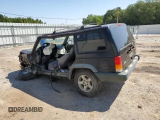 1998 Jeep Cherokee Sport with VIN 1J4FT68S9WL141631, listed as a Copart auction lot 68974974 with 0 mi miles and Salvage Title. Bid and sale history available at carsss.com. Image 2.