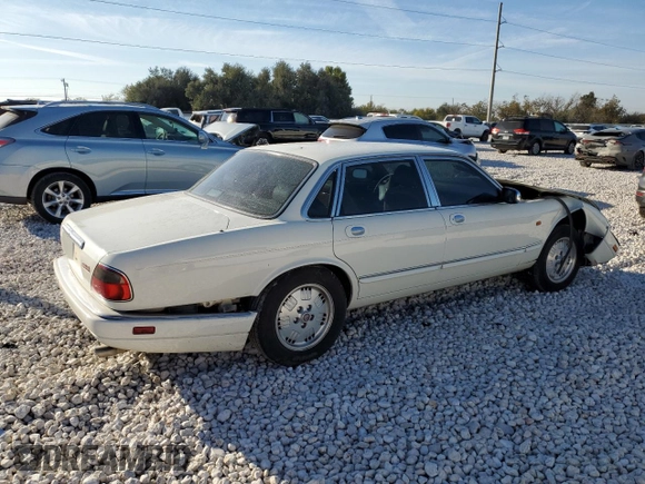 1995 Jaguar XJ with VIN SAJKX1745SC739290, listed as a Copart auction lot 82887524 with Not provided miles and Salvage title. Bid and sale history available at DreamBid. Image 3.