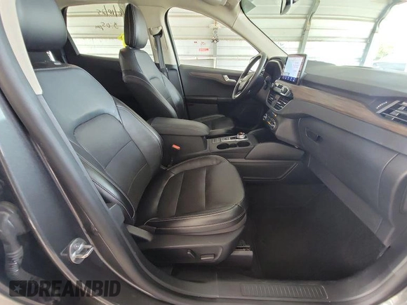 2020 Ford Escape Titanium Hybrid with VIN 1FMCU0DZ2LUB82013, listed as a IAAI auction lot 42854327 with 92,623 mi miles and . Bid and sale history available at DreamBid. Image 11.