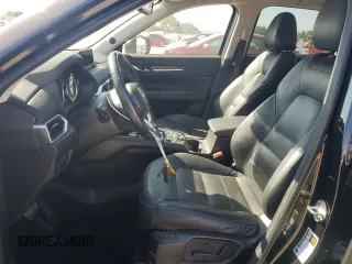 2018 Mazda CX-5 Grand Touring с VIN JM3KFADM2J1310339, выставлен на аукционе Copart как лот 64705245 с пробегом 63 927 миль миль и Списание • Salvage title. История ставок и продаж доступна на DreamBid. Изображение 7.