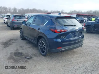 2022 Mazda CX-5 2.5 S Premium Package with VIN JM3KFBDM4N1528813, listed as a IAAI auction lot 41695842 with 29,994 mi miles. Bid and sale history available at carsss.com. Image 3.