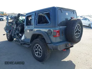 2024 Jeep Wrangler Rubicon with VIN 1C4PJXFG1RW335531, listed as a IAAI auction lot 40800569 with Not Provided miles. Bid and sale history available at carsss.com. Image 3.