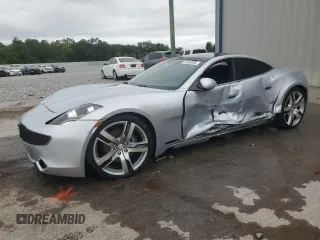 2012 Fisker Karma EcoSport z VIN YH4K14AAXCA000385, wystawiony jako Copart lot #51499665 z przebiegiem Nie podano mil oraz Szkody całkowita. Historia ofert i sprzedaży dostępna na DreamBid. Obrazek 1.