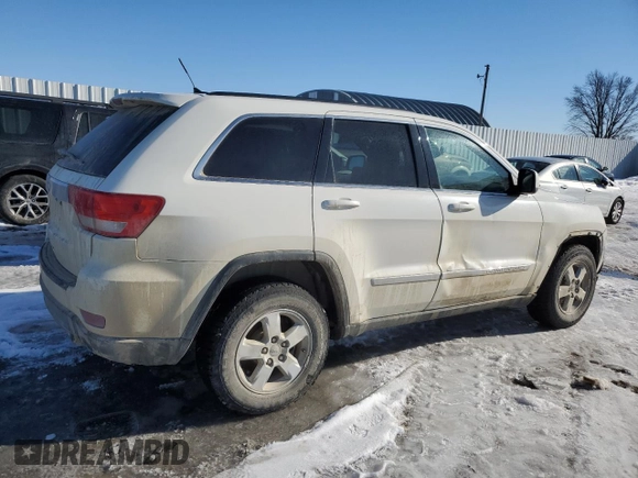 2012 Jeep Grand Cherokee Laredo with VIN 1C4RJFAG2CC267890, listed as a Copart auction lot 87832115 with 171,552 mi miles and Salvage Title. Bid and sale history available at carsss.com. Image 3.