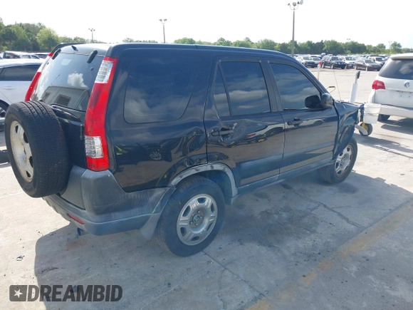 2005 Honda CR-V LX with VIN JHLRD78535C031868, listed as a IAAI auction lot 42002372 with 201,258 mi miles. Bid and sale history available at carsss.com. Image 4.