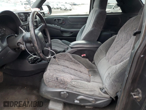 2000 Chevrolet Blazer LS z VIN 1GNCT18W1YK151830, wystawiony jako Copart lot #88799235 z przebiegiem 190 019 mil mil oraz Nie do naprawy • Non repairable. Historia ofert i sprzedaży dostępna na DreamBid. Obrazek 7.
