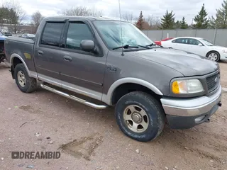 2002 Ford F-150 XLT with VIN 1FTRW08612KB42637, listed as a IAAI auction lot 42036615 with 178,548 mi miles. Bid and sale history available at carsss.com. Image 1.