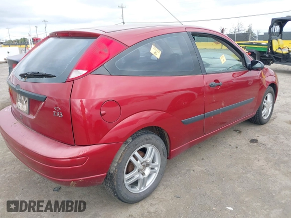 2003 Ford Focus ZX3 with VIN 3FAFP31Z23R187918, listed as a IAAI auction lot 41969325 with Not provided miles and . Bid and sale history available at DreamBid. Image 4.