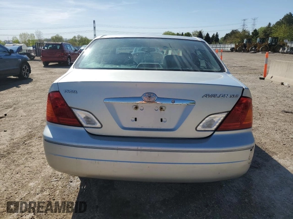 2000 Toyota Avalon XL with VIN 4T1BF28B5YU031947, listed as a Copart auction lot 56239265 with 167,627 mi miles and Salvage title. Bid and sale history available at DreamBid. Image 6.