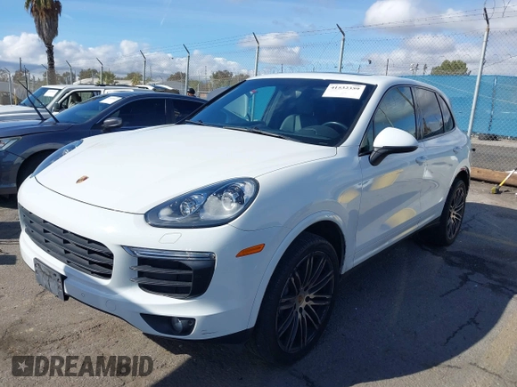 2017 Porsche Cayenne with VIN WP1AA2A23HKA80695, listed as a IAAI auction lot 41532359 with 71,628 mi miles. Bid and sale history available at carsss.com. Image 2.