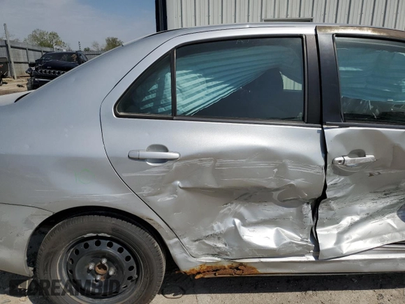2009 Toyota Yaris with VIN JTDBT903391300394, listed as a Copart auction lot 53392945 with 227,210 mi miles and Salvage Title. Bid and sale history available at DreamBid. Image 10.
