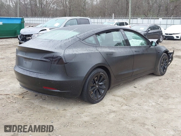 2022 Tesla Model 3 with VIN 5YJ3E1EA6NF186383, listed as a IAAI auction lot 41168967 with Not Provided miles and . Bid and sale history available at DreamBid. Image 4.