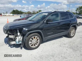 2019 Jeep Cherokee Latitude z VIN 1C4PJLCB5KD264451, wystawiony jako Copart lot #56658295 z przebiegiem 104 715 mil mil oraz Szkoda całkowita • Salvage title. Historia ofert i sprzedaży dostępna na DreamBid. Obrazek 1.