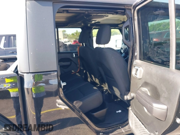 2021 Jeep Gladiator Willys with VIN 1C6HJTAGXML613431, listed as a IAAI auction lot 42180502 with 64,572 mi miles and . Bid and sale history available at DreamBid. Image 7.
