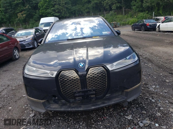 2023 BMW iX xDrive50 with VIN WB523CF05PCL62449, listed as a Copart auction lot 57069783 with 0 mi miles. Bid and sale history available at carsss.com. Image 5.