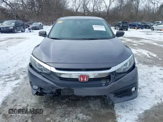 2017 Honda Civic EX-T with VIN 19XFC1E38HE031851, listed as a IAAI auction lot 41625294 with 97,432 mi miles and . Bid and sale history available at DreamBid. Image 13.