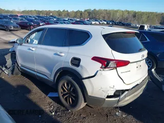 2019 Hyundai Santa Fe SE with VIN 5NMS2CAD6KH114027, listed as a IAAI auction lot 41874556 with 125,729 mi miles. Bid and sale history available at carsss.com. Image 3.