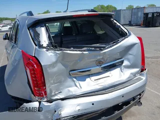 2011 Cadillac SRX Luxury Collection z VIN 3GYFNAEY9BS642724, wystawiony jako IAAI lot #42067396 z przebiegiem 177 473 mil mil oraz . Historia ofert i sprzedaży dostępna na DreamBid. Obrazek 6.