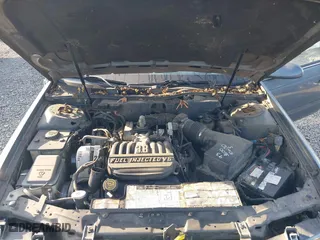 1993 Ford Taurus GL with VIN 1FALP5240PG327124, listed as a IAAI auction lot 42074204 with 27,681 mi miles. Bid and sale history available at carsss.com. Image 10.