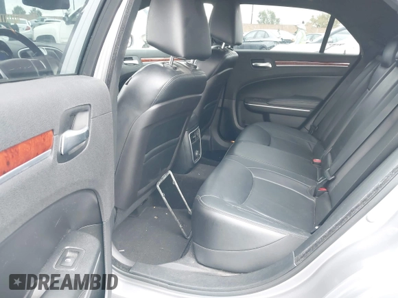 2014 Chrysler 300 with VIN 2C3CCAAG7EH249196, listed as a IAAI auction lot 42180023 with 48,241 mi miles and . Bid and sale history available at DreamBid. Image 8.
