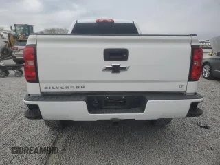 2018 Chevrolet Silverado 1500 LT with VIN 1GCVKREC7JZ176712, listed as a Copart auction lot 52084215 with 154,521 mi miles and Salvage Title. Bid and sale history available at DreamBid. Image 6.