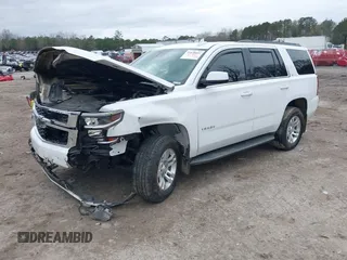 2020 Chevrolet Tahoe LT with VIN 1GNSKBKC2LR253012, listed as a IAAI auction lot 41870002 with 127,789 mi miles and . Bid and sale history available at DreamBid. Image 2.