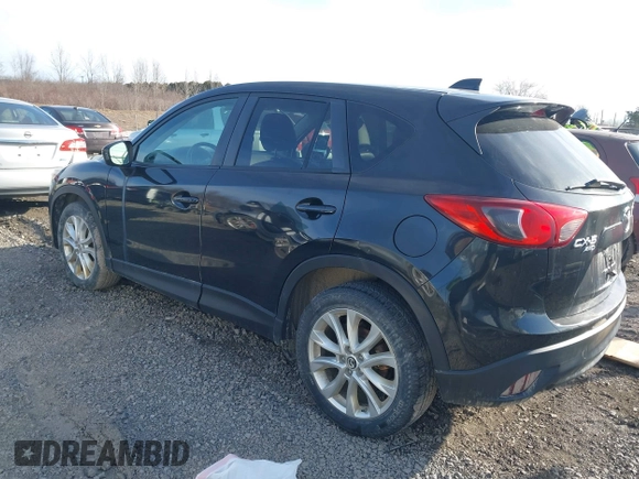 2013 Mazda CX-5 Grand Touring with VIN JM3KE4DE8D0151219, listed as a IAAI auction lot 41784657 with 177,903 mi miles. Bid and sale history available at carsss.com. Image 3.