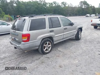 2000 Jeep Grand Cherokee Laredo z VIN 1J4G248N2YC334566, wystawiony jako IAAI lot #42623519 z przebiegiem Nie podano mil oraz . Historia ofert i sprzedaży dostępna na DreamBid. Obrazek 4.