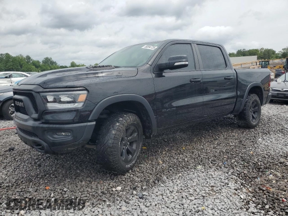 2020 Ram 1500 Rebel with VIN 1C6SRFLT5LN408810, listed as a Copart auction lot 56894725 with 49,089 mi miles and Salvage title. Bid and sale history available at DreamBid. Image 1.