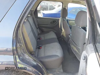 2003 Ford Escape XLT Popular 2 with VIN 1FMYU93103KE17610, listed as a IAAI auction lot 41766806 with 1 mi miles. Bid and sale history available at carsss.com. Image 8.