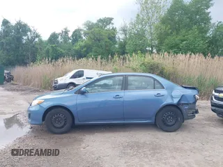 2013 Toyota Corolla L with VIN 5YFBU4EE9DP210262, listed as a IAAI auction lot 42209025 with 204,463 mi miles and . Bid and sale history available at DreamBid. Image 15.