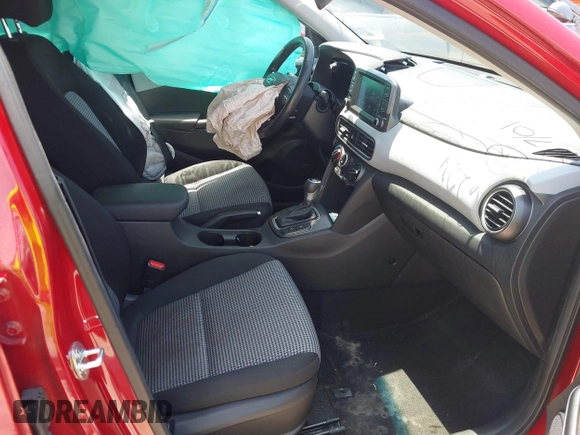 2021 Hyundai Kona SEL with VIN KM8K22AA8MU601480, listed as a IAAI auction lot 39589701 with 55,876 mi miles and . Bid and sale history available at carsss.com. Image 5.