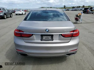 2018 BMW 7 Series 740i with VIN WBA7E2C59JG741689, listed as a Copart auction lot 50948855 with 96,337 mi miles and Salvage Title. Bid and sale history available at carsss.com. Image 6.