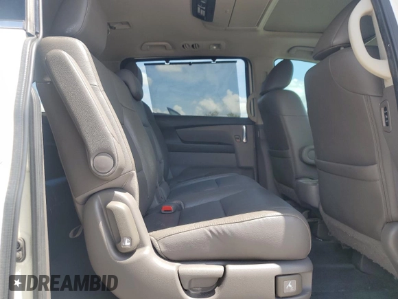 2017 Honda Odyssey Touring z VIN 5FNRL5H99HB007993, wystawiony jako Copart lot #60501805 z przebiegiem 104 628 mil mil oraz Szkoda całkowita • Salvage title. Historia ofert i sprzedaży dostępna na DreamBid. Obrazek 11.