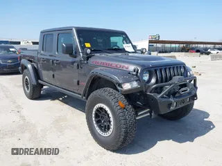 2021 Jeep Gladiator Rubicon z VIN 1C6JJTBG1ML602186, wystawiony jako IAAI lot #41782662 z przebiegiem 37 840 mil mil oraz . Historia ofert i sprzedaży dostępna na DreamBid. Obrazek 1.