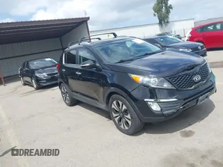 2013 Kia Sportage SX with VIN KNDPCCA61D7385219, listed as a IAAI auction lot 41945345 with 112,471 mi miles and . Bid and sale history available at carsss.com. Image 1.