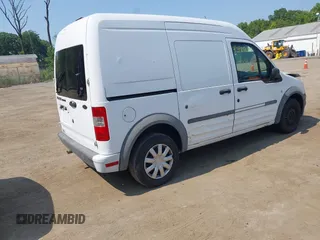 2010 Ford Transit Connect XL z VIN NM0LS7CN7AT000582, wystawiony jako IAAI lot #42425627 z przebiegiem 193 333 mil mil oraz . Historia ofert i sprzedaży dostępna na DreamBid. Obrazek 4.