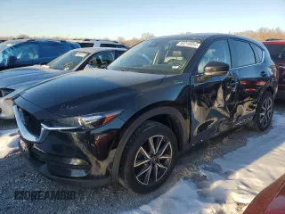 2018 Mazda CX-5 Touring z VIN JM3KFACM9J0300642, wystawiony jako Copart lot #80210854 z przebiegiem 118 309 mil mil oraz Szkoda całkowita • Salvage title. Historia ofert i sprzedaży dostępna na DreamBid. Obrazek 1.