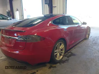 2016 Tesla Model S 90D with VIN 5YJSA1E24GF141543, listed as a IAAI auction lot 42045333 with Not Provided miles and . Bid and sale history available at DreamBid. Image 4.