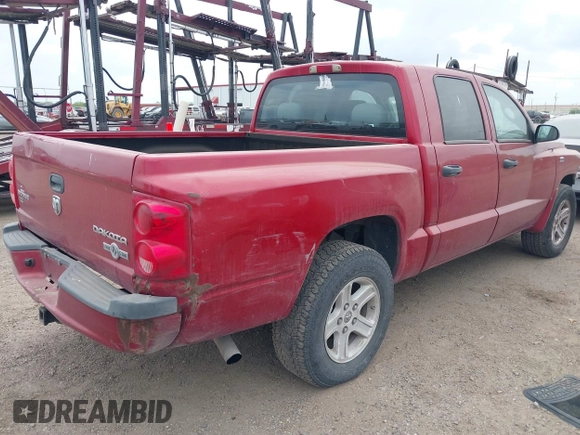 2010 Dodge Dakota with VIN 1D7CE3GP0AS166078, listed as a IAAI auction lot 41856634 with 235,615 mi miles and . Bid and sale history available at DreamBid. Image 4.