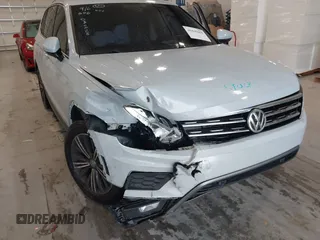 2019 Volkswagen Tiguan SE with VIN 3VV3B7AX9KM030028, listed as a IAAI auction lot 40445099 with 85,400 mi miles and . Bid and sale history available at DreamBid. Image 6.