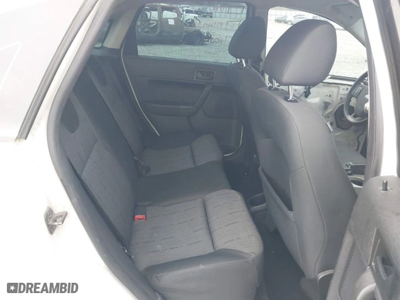 2009 Ford Focus SE with VIN 1FAHP35NX9W141890, listed as a IAAI auction lot 41709648 with 174,372 mi miles. Bid and sale history available at carsss.com. Image 8.