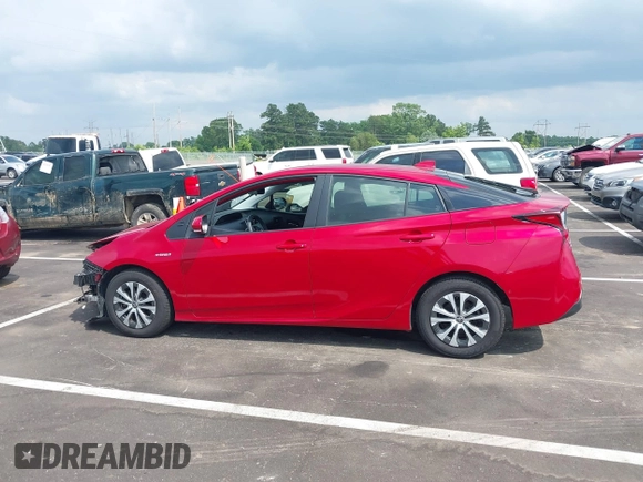 2021 Toyota Prius LE with VIN JTDL9MFU0M3029880, listed as a IAAI auction lot 42450003 with 91,558 mi miles and . Bid and sale history available at DreamBid. Image 14.
