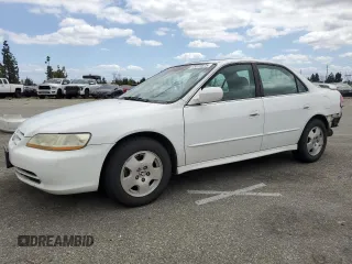 2001 Honda Accord EX z VIN 1HGCG16521A055404, wystawiony jako Copart lot #56819575 z przebiegiem 142 953 mil mil oraz Szkoda całkowita • Salvage title. Historia ofert i sprzedaży dostępna na DreamBid. Obrazek 1.