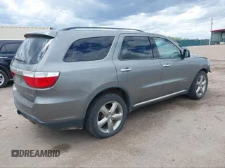 2011 Dodge Durango Citadel with VIN 1D4RE5GG5BC664579, listed as a IAAI auction lot 40812809 with 209,743 mi miles. Bid and sale history available at carsss.com. Image 4.