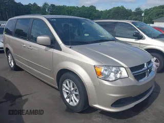 2014 Dodge Grand Caravan SXT z VIN 2C4RDGCG6ER162533, wystawiony jako IAAI lot #42251591 z przebiegiem 70 666 mil mil oraz . Historia ofert i sprzedaży dostępna na DreamBid. Obrazek 1.