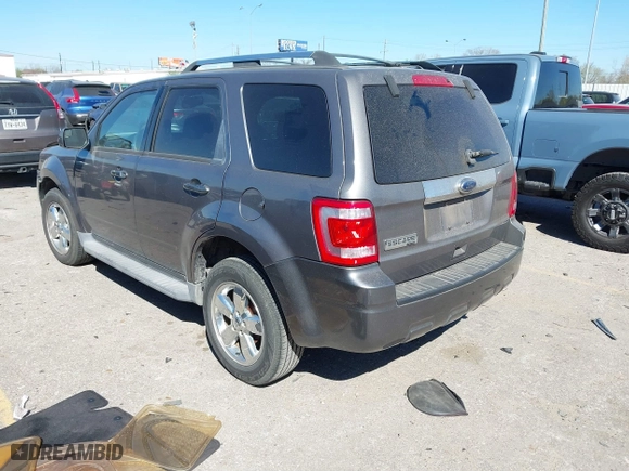 2011 Ford Escape Limited with VIN 1FMCU0EG2BKA67855, listed as a IAAI auction lot 41808002 with 183,476 mi miles. Bid and sale history available at carsss.com. Image 3.