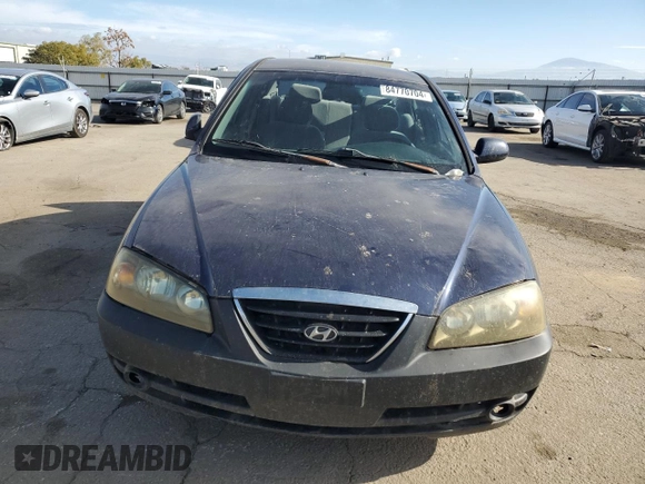 2004 Hyundai Elantra GLS z VIN KMHDN46D94U898709, wystawiony jako Copart lot #84770704 z przebiegiem 216 785 mil mil oraz Szkoda całkowita • Salvage title. Historia ofert i sprzedaży dostępna na DreamBid. Obrazek 5.