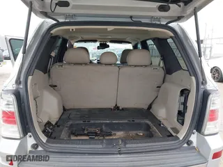 2008 Mercury Mariner Premier with VIN 4M2CU87178KJ19754, listed as a IAAI auction lot 41595974 with 239,180 mi miles. Bid and sale history available at carsss.com. Image 18.